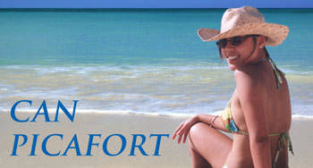 Playa de Can Picafort, chica tomando el sol